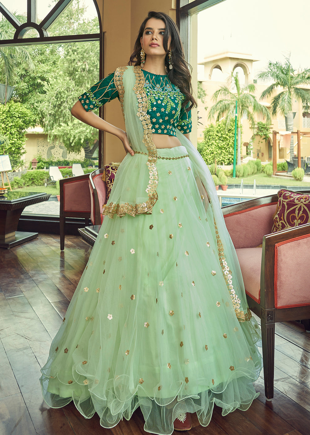 Glamorous Pista Green Heavy Net Party Wear Lehenga Choli Glamorous Pista Green Heavy Net Party Wear Lehenga Choli