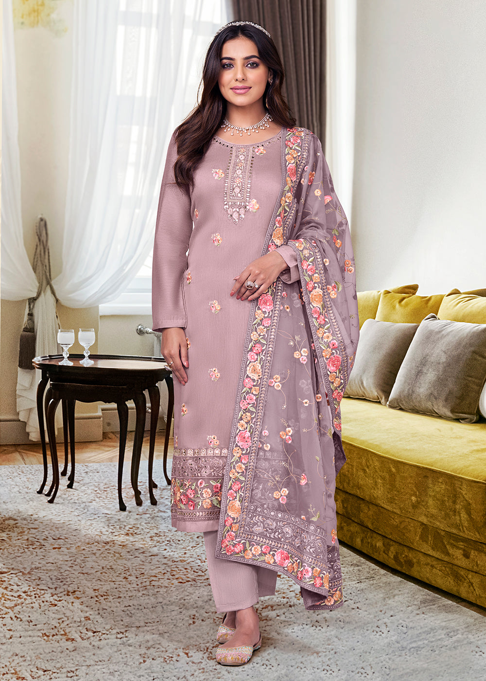purple dress shalwar kameez Amethyst is a refined raw silk shalwar kameez in a deep purple shade. The shirt features a simple round neckline with button detailing and chooridar sleeves, while the back is finished with