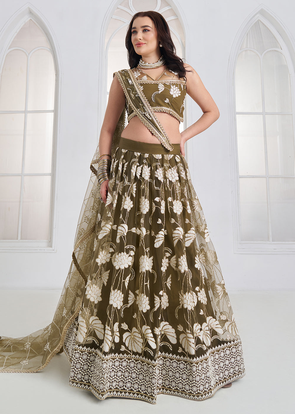 Buy Now Green Tone to Tone Threads Embroidery Wedding Lehanga Choli Online in US, UK, Canada, France, Italy, Germany, Sweden, Austria &amp; Worldwide at Empress.
