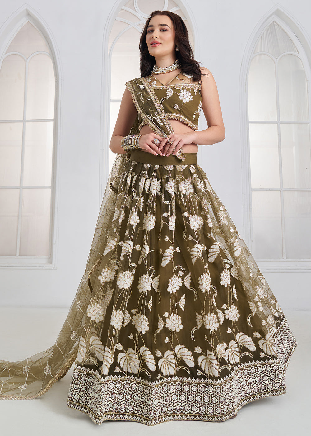 Buy Now Green Tone to Tone Threads Embroidery Wedding Lehanga Choli Online in US, UK, Canada, France, Italy, Germany, Sweden, Austria &amp; Worldwide at Empress.