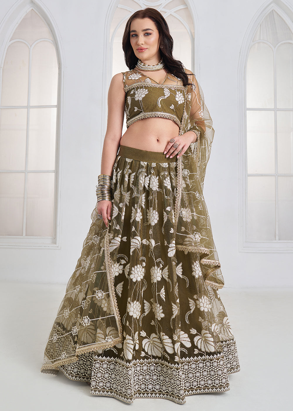 Buy Now Green Tone to Tone Threads Embroidery Wedding Lehanga Choli Online in US, UK, Canada, France, Italy, Germany, Sweden, Austria &amp; Worldwide at Empress.