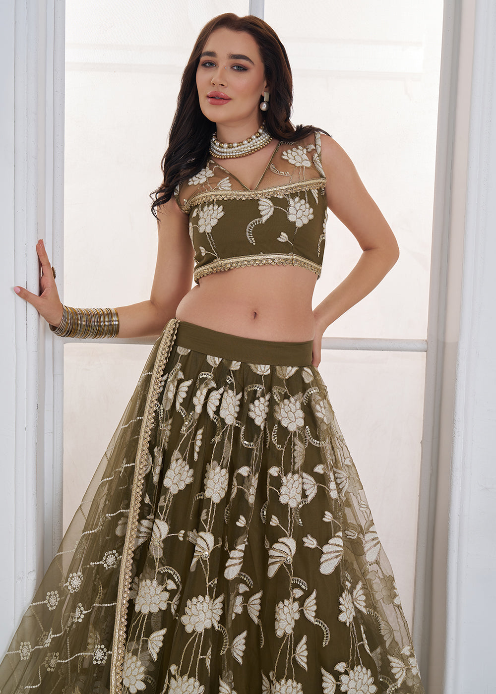 Buy Now Green Tone to Tone Threads Embroidery Wedding Lehanga Choli Online in US, UK, Canada, France, Italy, Germany, Sweden, Austria &amp; Worldwide at Empress.