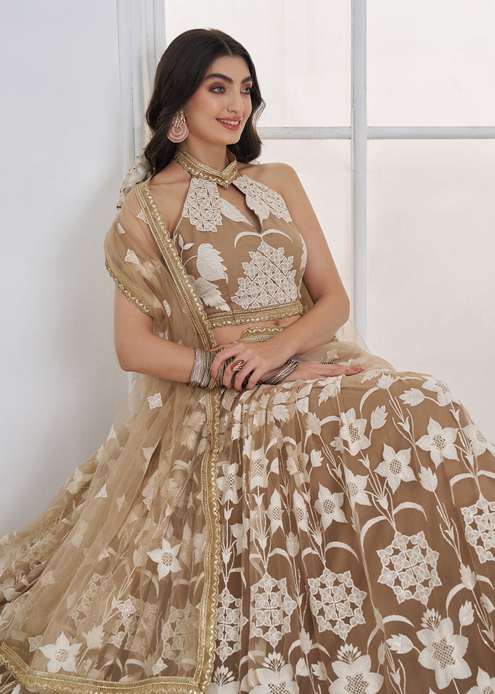 Buy Now Beige Tone to Tone Threads Embroidery Wedding Lehanga Choli Online in US, UK, Canada, France, Italy, Germany, Sweden, Austria &amp; Worldwide at Empress.