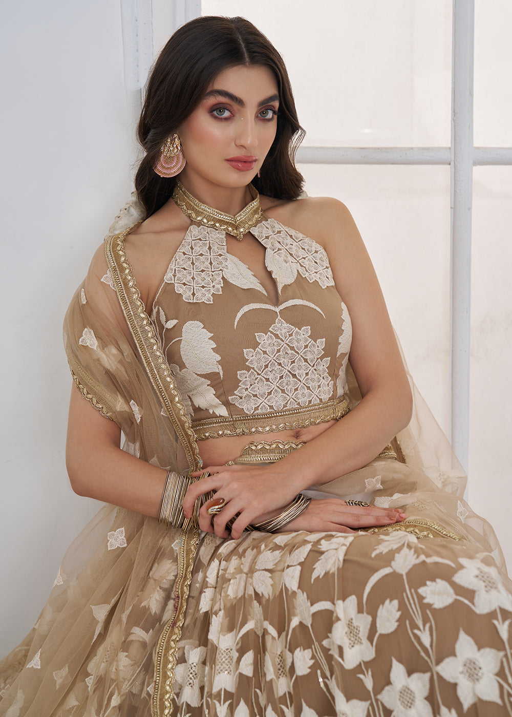 Buy Now Beige Tone to Tone Threads Embroidery Wedding Lehanga Choli Online in US, UK, Canada, France, Italy, Germany, Sweden, Austria & Worldwide at Empress.