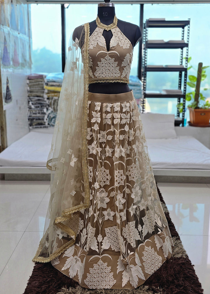 Buy Now Beige Tone to Tone Threads Embroidery Wedding Lehanga Choli Online in US, UK, Canada, France, Italy, Germany, Sweden, Austria &amp; Worldwide at Empress.