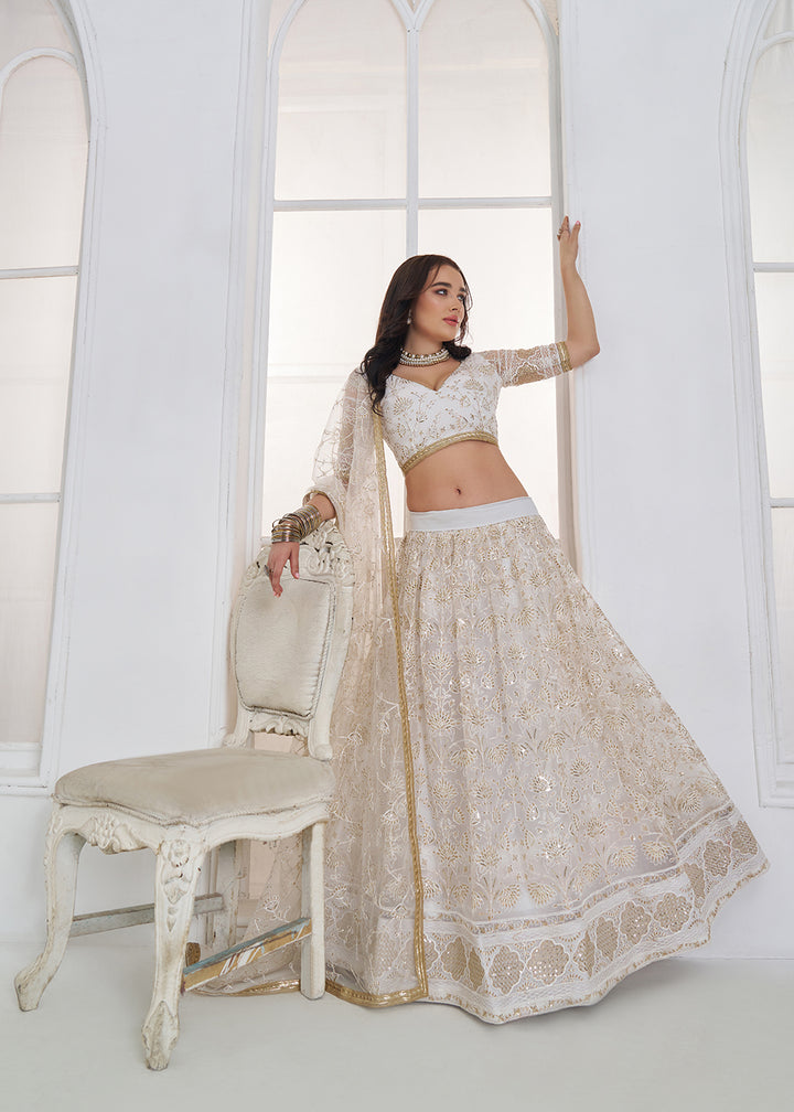 Buy Now Off White Tone to Tone Threads Embroidery Wedding Lehanga Choli Online in US, UK, Canada, France, Italy, Germany, Sweden, Austria &amp; Worldwide at Empress.