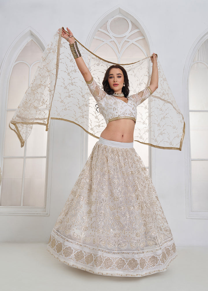 Buy Now Off White Tone to Tone Threads Embroidery Wedding Lehanga Choli Online in US, UK, Canada, France, Italy, Germany, Sweden, Austria &amp; Worldwide at Empress.