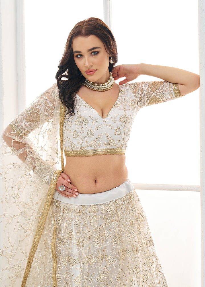 Buy Now Off White Tone to Tone Threads Embroidery Wedding Lehanga Choli Online in US, UK, Canada, France, Italy, Germany, Sweden, Austria &amp; Worldwide at Empress.