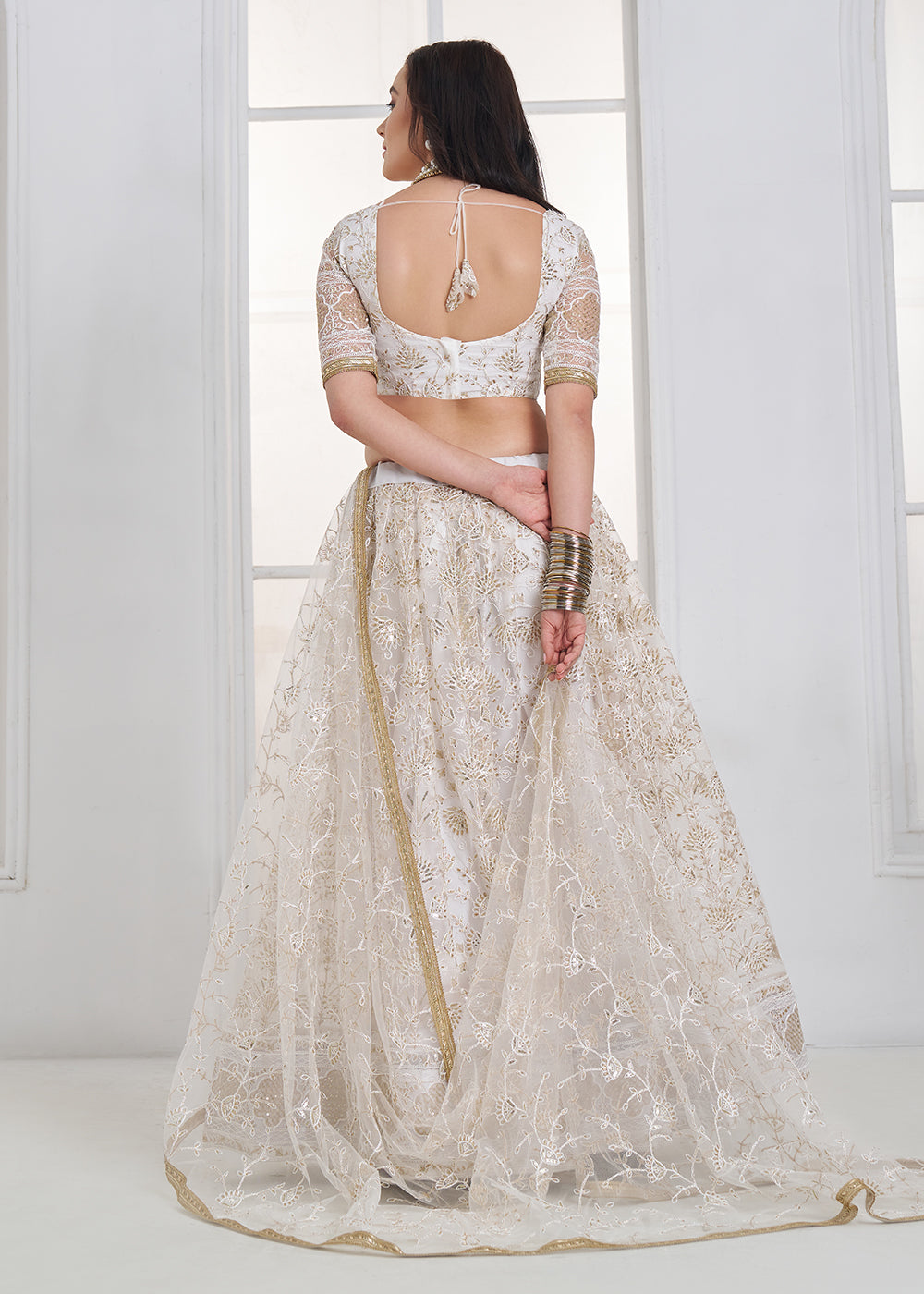 Buy Now Off White Tone to Tone Threads Embroidery Wedding Lehanga Choli Online in US, UK, Canada, France, Italy, Germany, Sweden, Austria &amp; Worldwide at Empress.