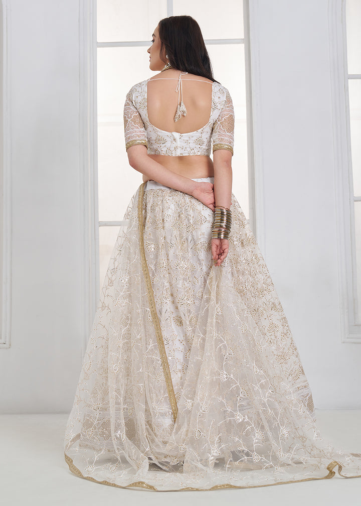 Buy Now Off White Tone to Tone Threads Embroidery Wedding Lehanga Choli Online in US, UK, Canada, France, Italy, Germany, Sweden, Austria &amp; Worldwide at Empress.