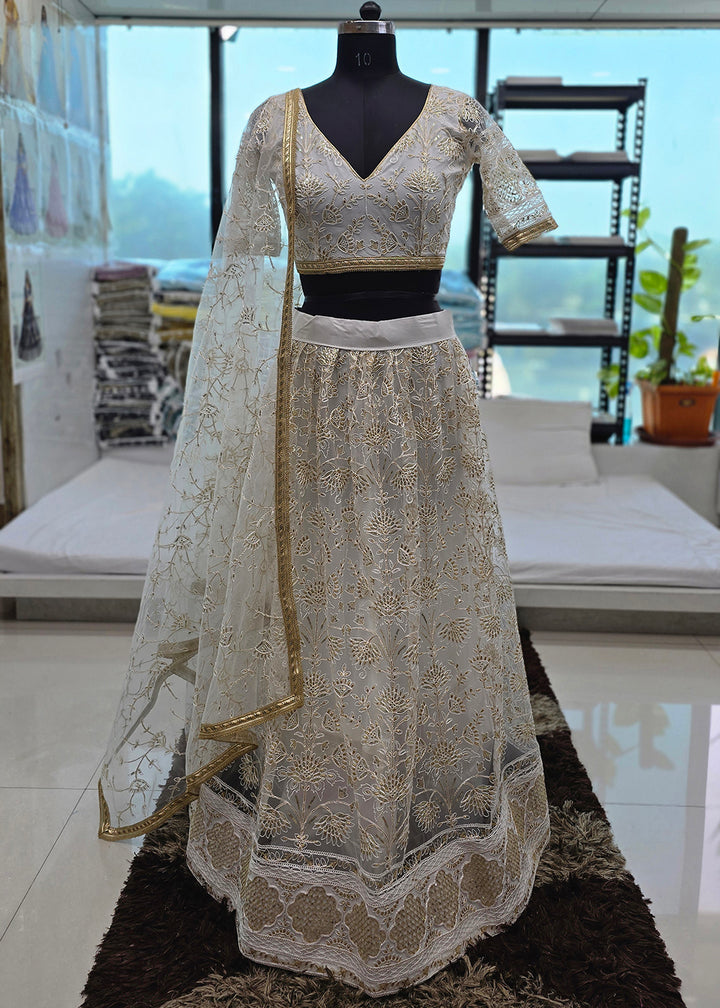 Buy Now Off White Tone to Tone Threads Embroidery Wedding Lehanga Choli Online in US, UK, Canada, France, Italy, Germany, Sweden, Austria &amp; Worldwide at Empress.
