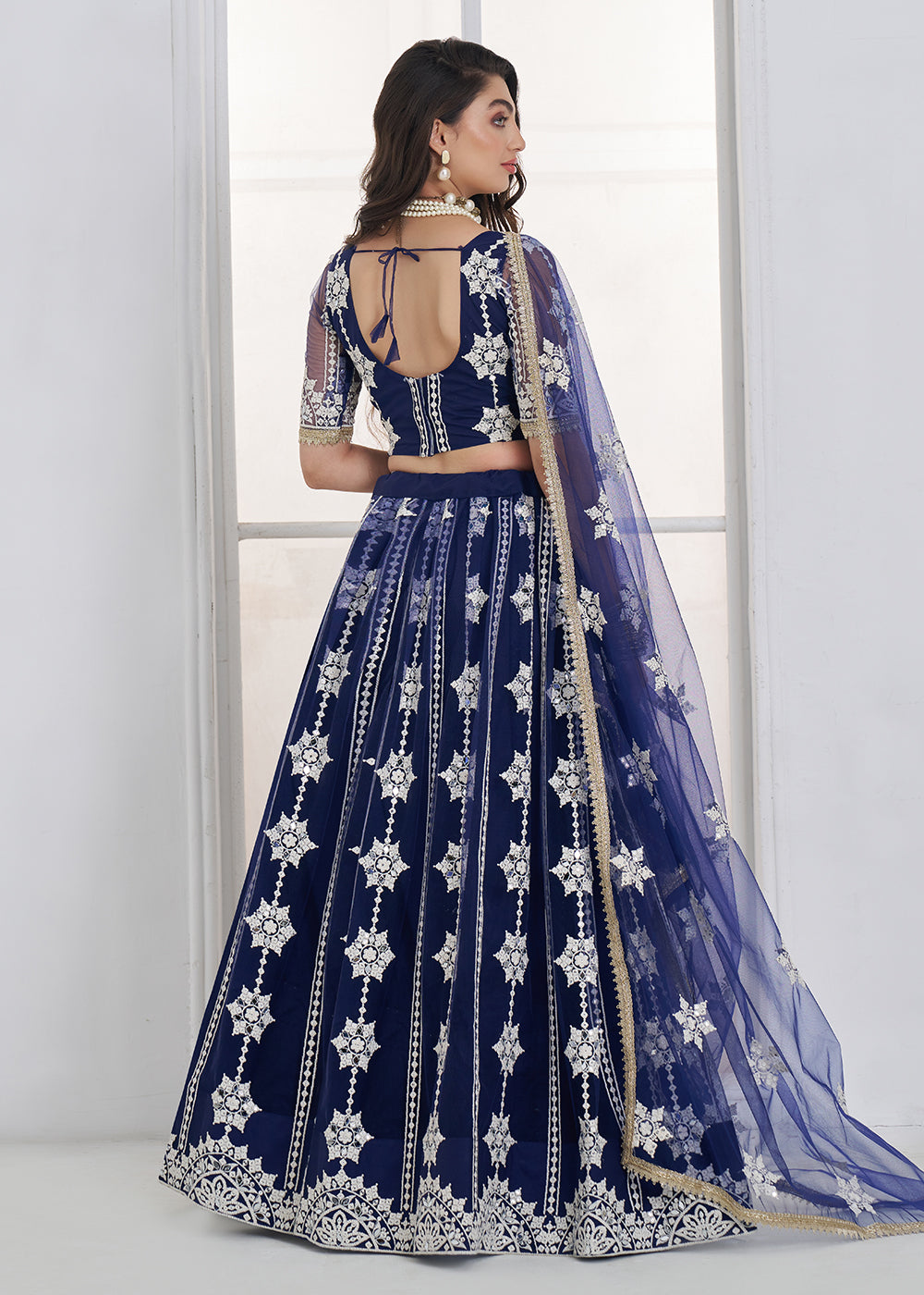 Buy Now Navy Blue Tone to Tone Threads Embroidery Wedding Lehanga Choli Online in US, UK, Canada, France, Italy, Germany, Sweden, Austria &amp; Worldwide at Empress