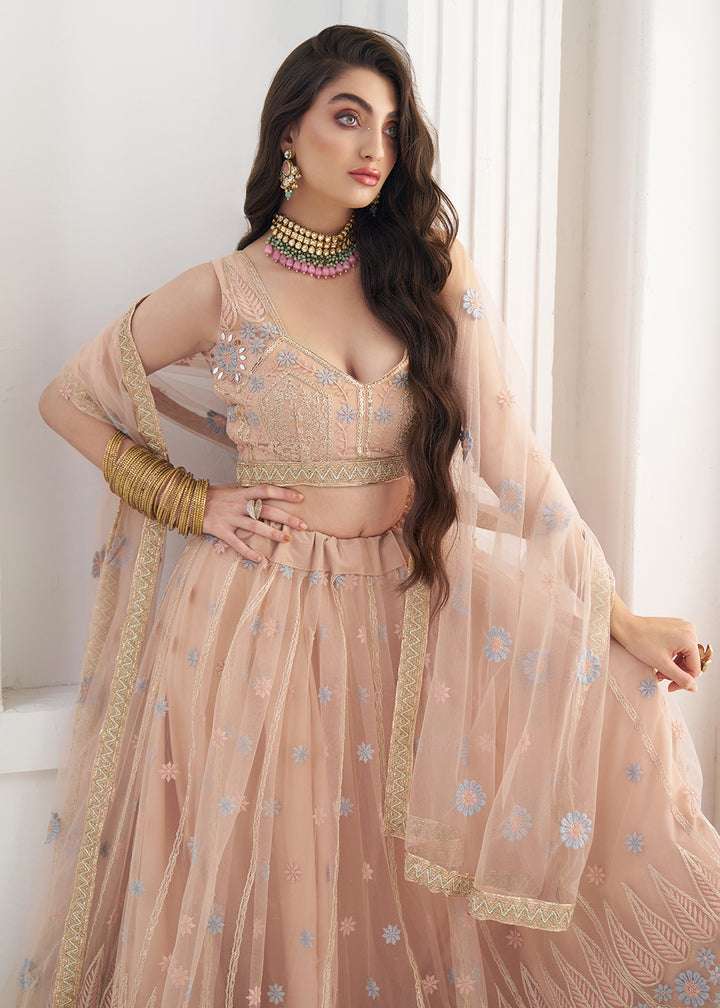 Buy Now Peach Tone to Tone Threads Embroidery Wedding Lehanga Choli Online in US, UK, Canada, France, Italy, Germany, Sweden, Austria &amp; Worldwide at Empress.
