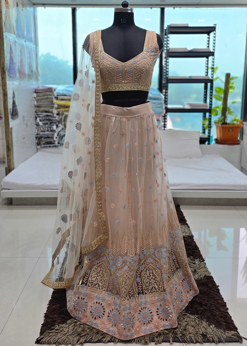 Buy Now Peach Tone to Tone Threads Embroidery Wedding Lehanga Choli Online in US, UK, Canada, France, Italy, Germany, Sweden, Austria &amp; Worldwide at Empress.