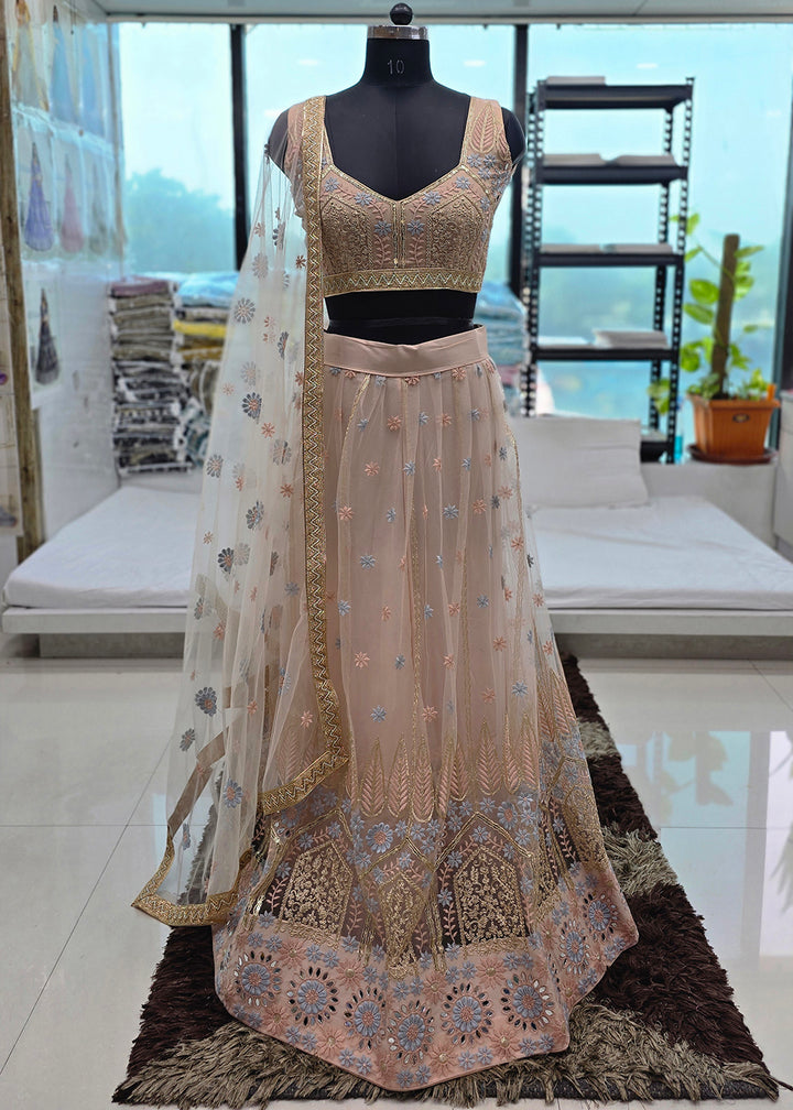 Buy Now Peach Tone to Tone Threads Embroidery Wedding Lehanga Choli Online in US, UK, Canada, France, Italy, Germany, Sweden, Austria &amp; Worldwide at Empress.