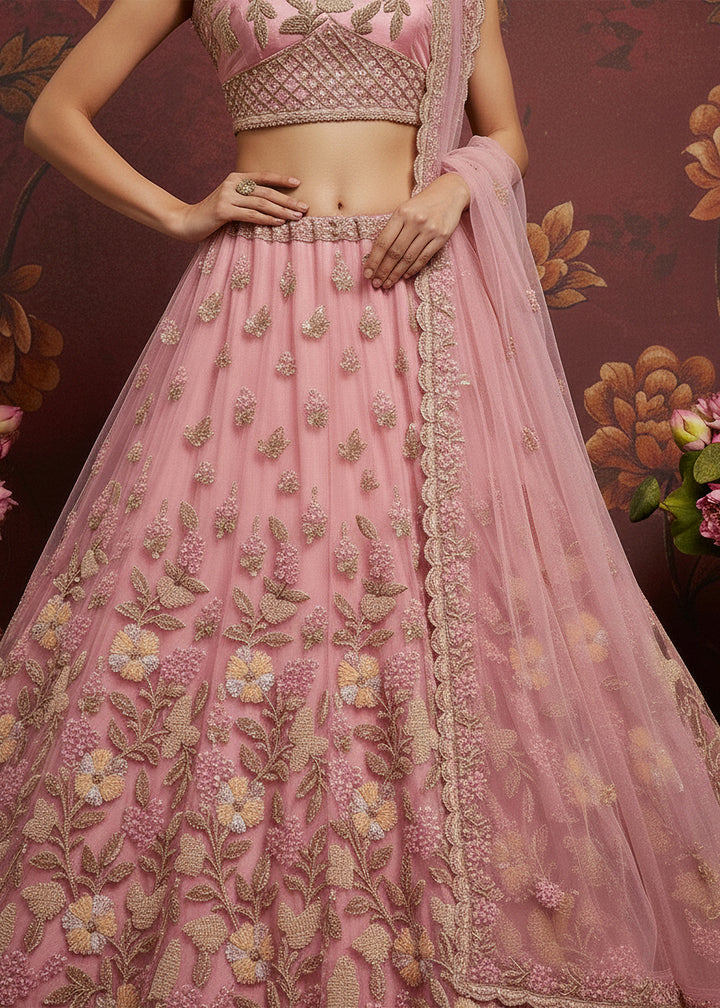 Buy Now Carnation Pink Heavy Net Bridal Wear Lehenga Online in US, UK, Canada, France, Germany, Sweden, Greece, Denmark, Spain, Africa & Worldwide at Empress.