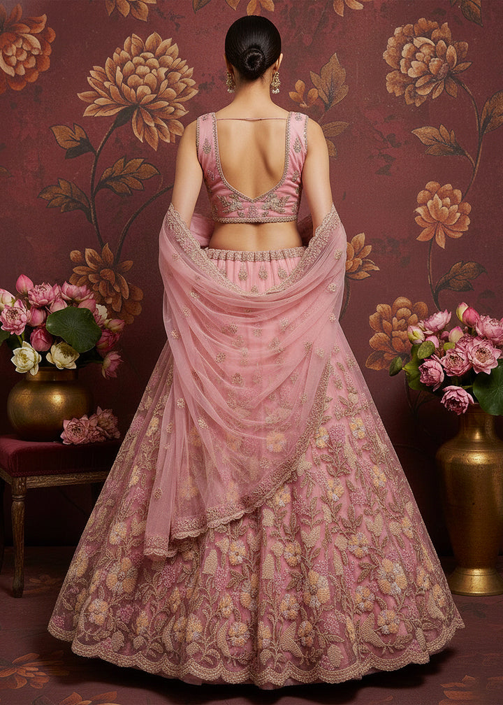 Buy Now Carnation Pink Heavy Net Bridal Wear Lehenga Online in US, UK, Canada, France, Germany, Sweden, Greece, Denmark, Spain, Africa & Worldwide at Empress.
