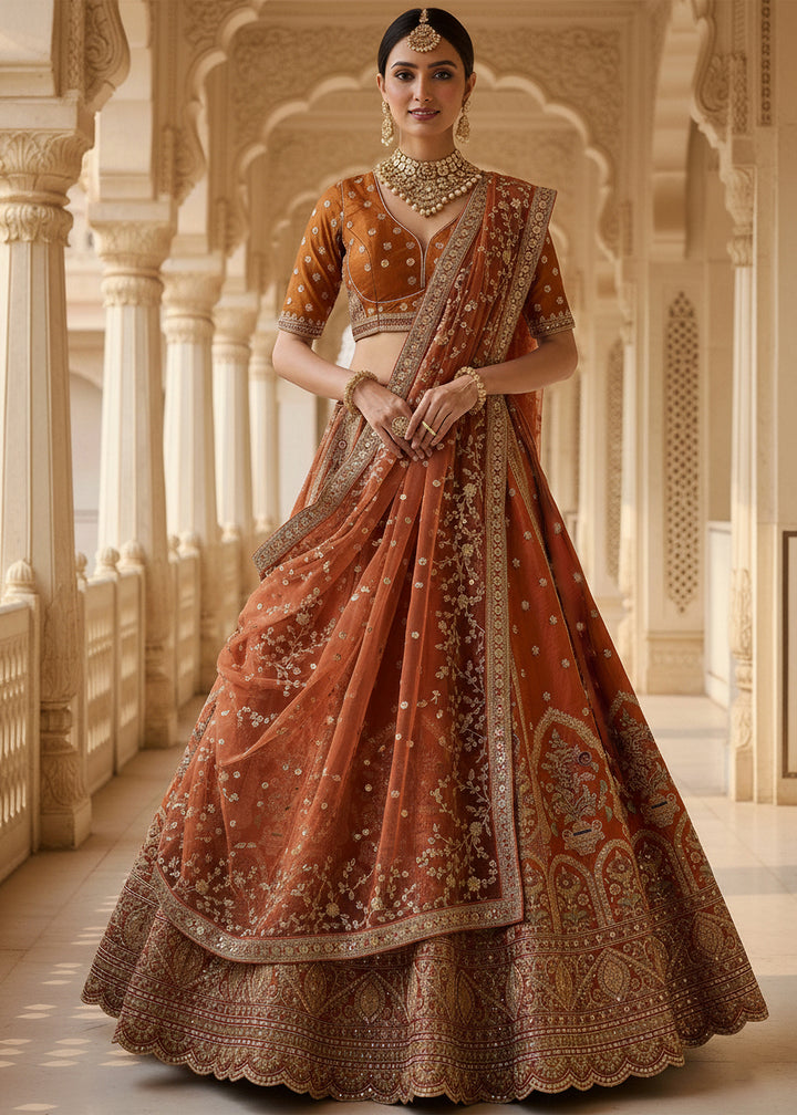 Buy Now Orange Ghadwal Silk Premium Embroidered Lehenga Online in US, UK, Canada, France, Germany, Sweden, Greece, Denmark, Spain, UAE & Worldwide at Empress.
