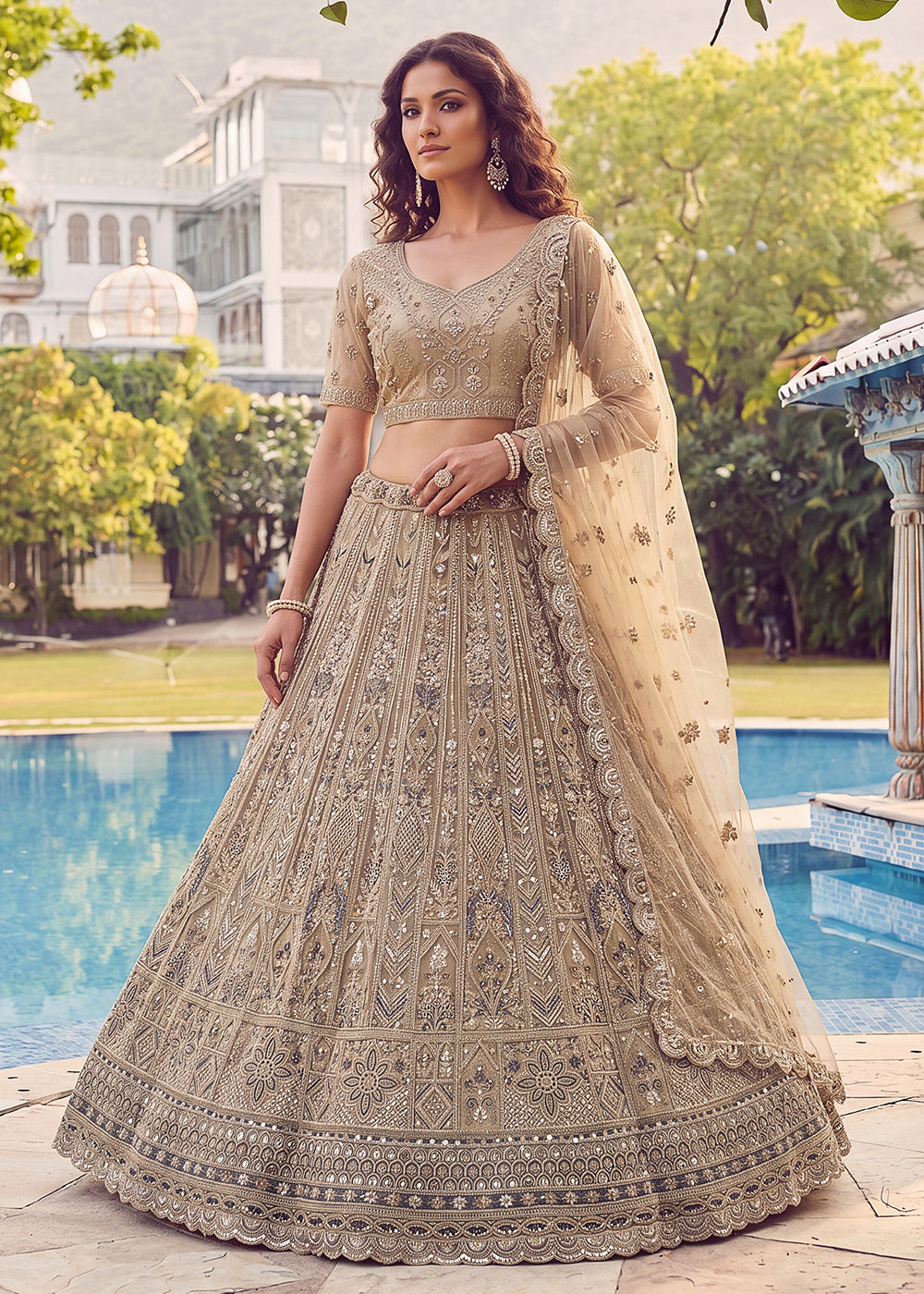 Buy Now Embroidered Dusty Gold Net Bridal Designer Lehenga Choli Online in US, UK, Canada, France, Italy, Germany, Sweden, UAE &amp; Worldwide at Empress Clothing.