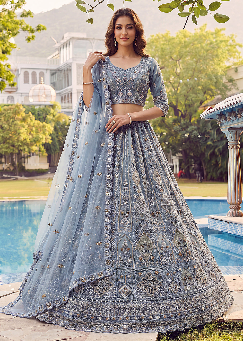 Buy Now Embroidered Sky Blue Net Bridal Designer Lehenga Choli Online in US, UK, Canada, France, Italy, Germany, Sweden, UAE &amp; Worldwide at Empress Clothing.