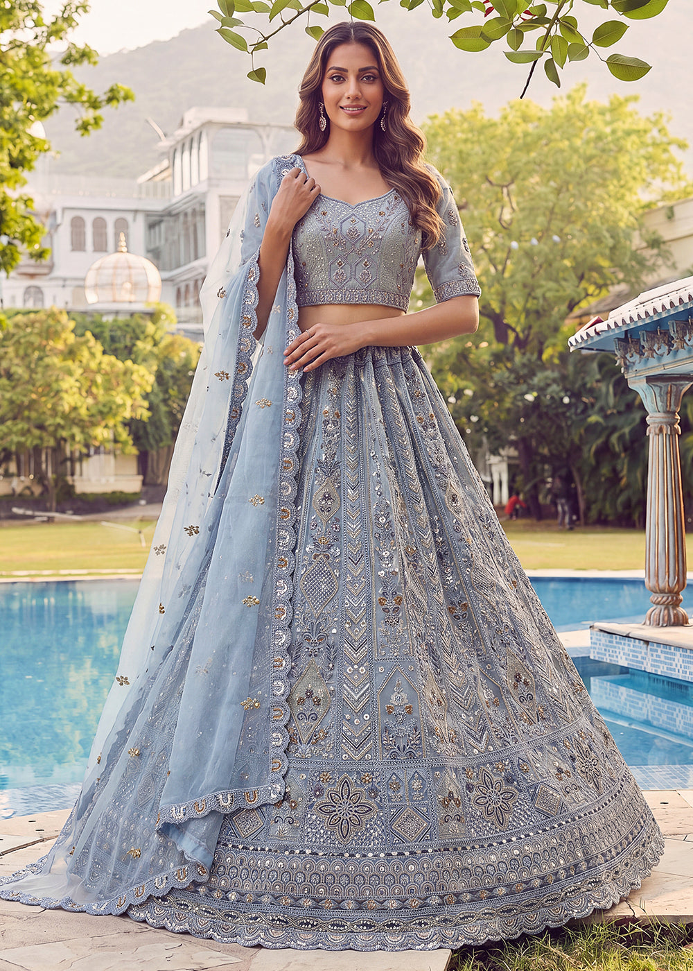 Buy Now Embroidered Sky Blue Net Bridal Designer Lehenga Choli Online in US, UK, Canada, France, Italy, Germany, Sweden, UAE &amp; Worldwide at Empress Clothing.