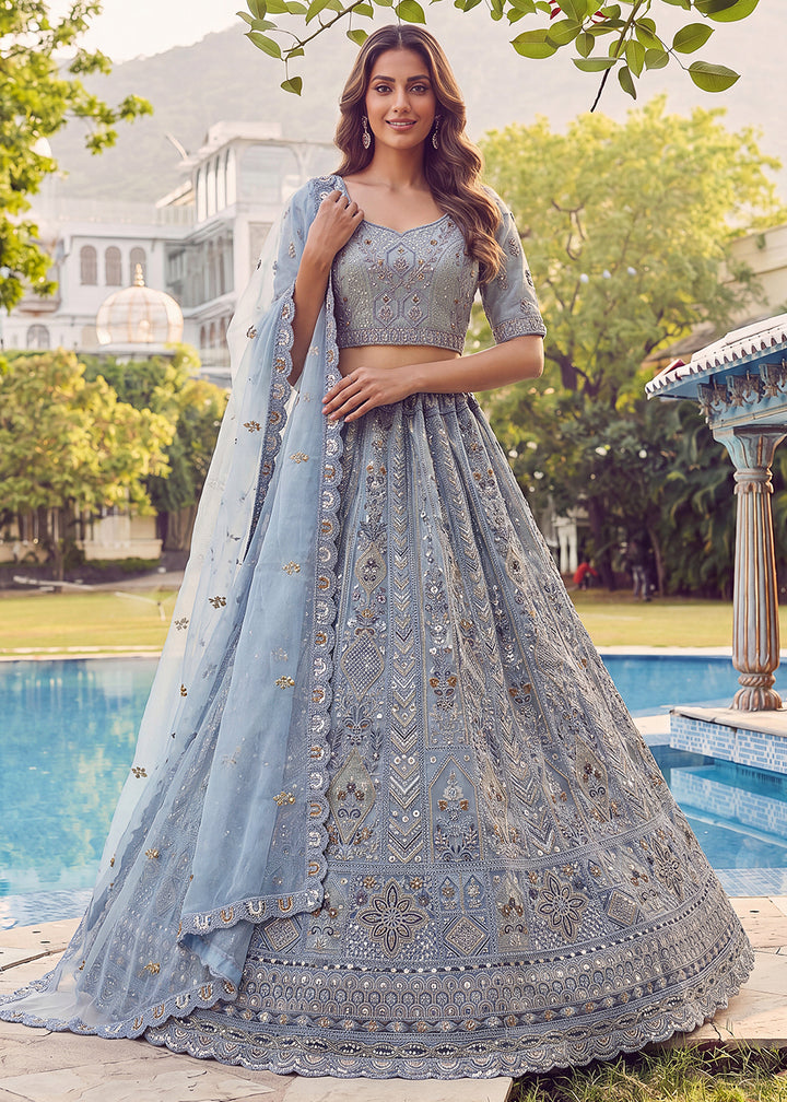 Buy Now Embroidered Sky Blue Net Bridal Designer Lehenga Choli Online in US, UK, Canada, France, Italy, Germany, Sweden, UAE &amp; Worldwide at Empress Clothing.