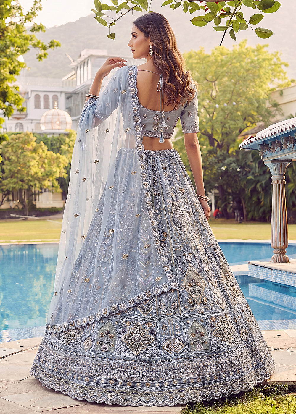 Buy Now Embroidered Sky Blue Net Bridal Designer Lehenga Choli Online in US, UK, Canada, France, Italy, Germany, Sweden, UAE &amp; Worldwide at Empress Clothing.