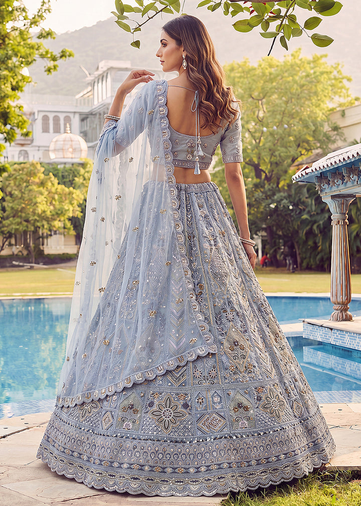 Buy Now Embroidered Sky Blue Net Bridal Designer Lehenga Choli Online in US, UK, Canada, France, Italy, Germany, Sweden, UAE &amp; Worldwide at Empress Clothing.