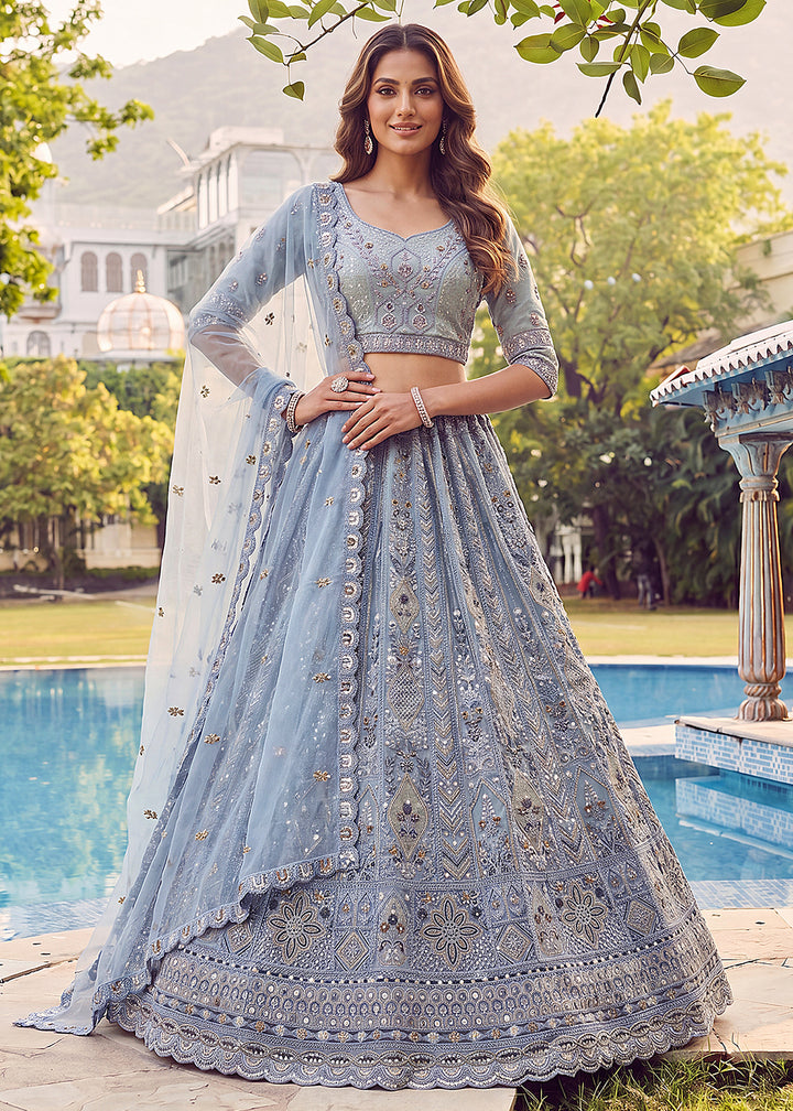 Buy Now Embroidered Sky Blue Net Bridal Designer Lehenga Choli Online in US, UK, Canada, France, Italy, Germany, Sweden, UAE &amp; Worldwide at Empress Clothing.