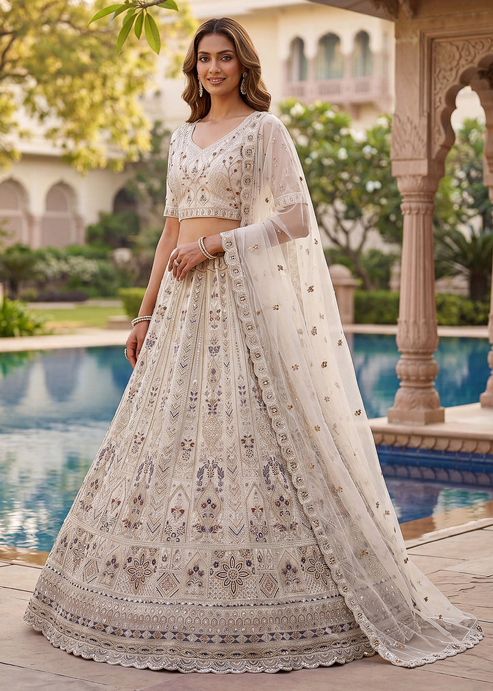 Buy Now Embroidered White Net Bridal Designer Lehenga Choli Online in US, UK, Canada, France, Italy, Germany, Sweden, UAE &amp; Worldwide at Empress Clothing.