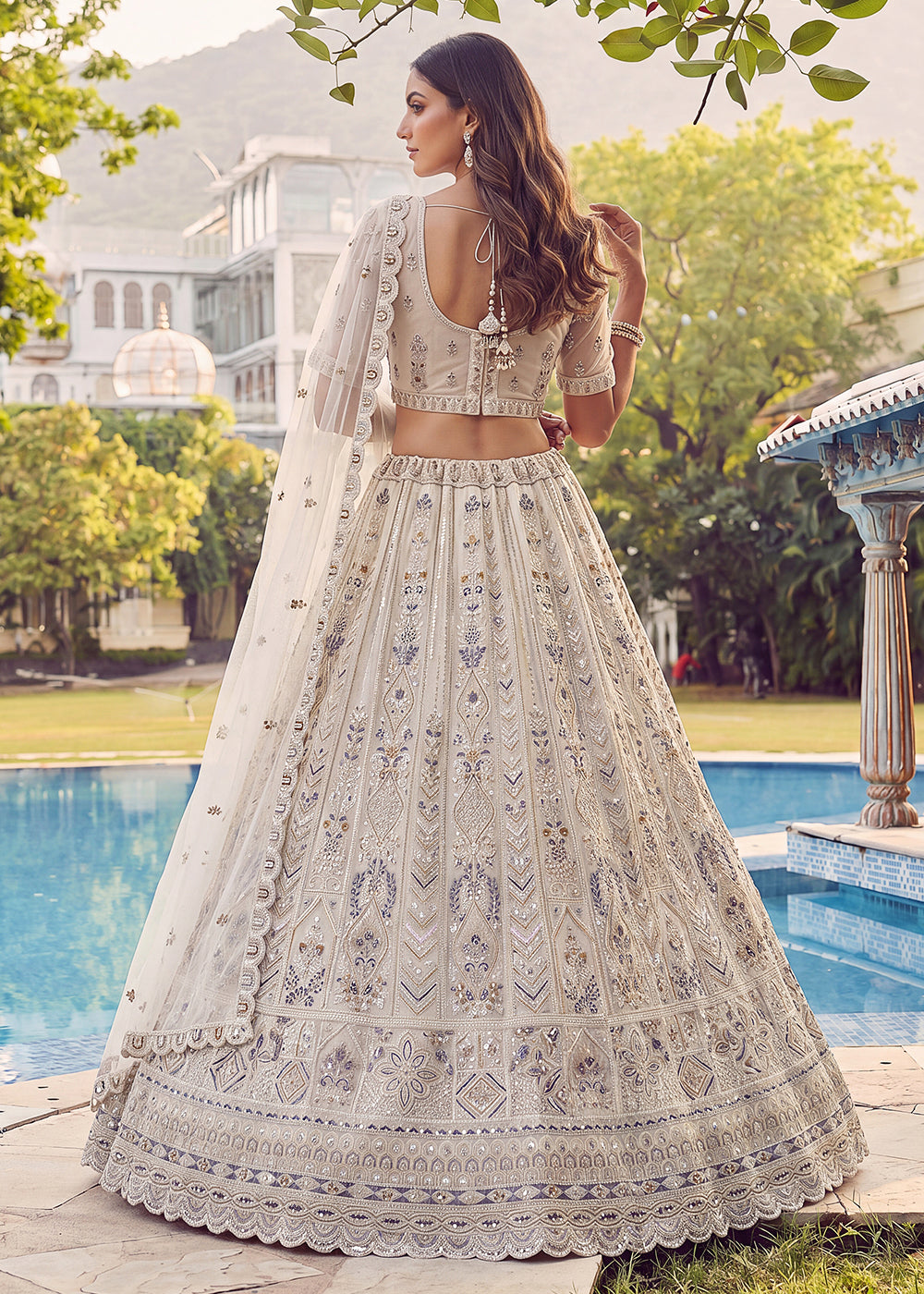 Buy Now Embroidered White Net Bridal Designer Lehenga Choli Online in US, UK, Canada, France, Italy, Germany, Sweden, UAE &amp; Worldwide at Empress Clothing.