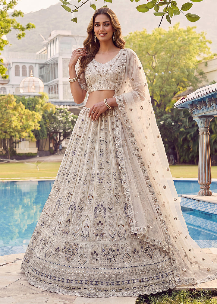 Buy Now Embroidered White Net Bridal Designer Lehenga Choli Online in US, UK, Canada, France, Italy, Germany, Sweden, UAE &amp; Worldwide at Empress Clothing.