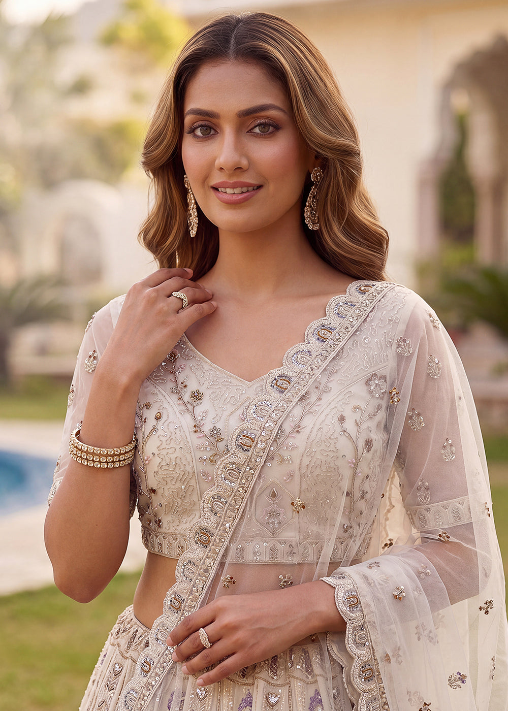 Buy Now Embroidered White Net Bridal Designer Lehenga Choli Online in US, UK, Canada, France, Italy, Germany, Sweden, UAE &amp; Worldwide at Empress Clothing.