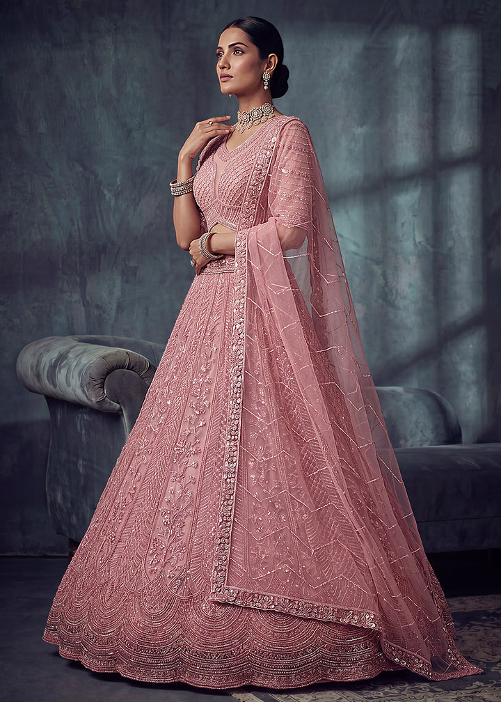 Buy Now Bridal Peach Embroidered Designer Style Lehenga Choli Online in US, UK, Canada, France, Italy, Germany, Sweden, UAE &amp; Worldwide at Empress Clothing.
