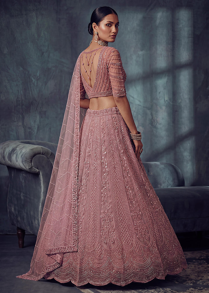 Buy Now Bridal Peach Embroidered Designer Style Lehenga Choli Online in US, UK, Canada, France, Italy, Germany, Sweden, UAE &amp; Worldwide at Empress Clothing.
