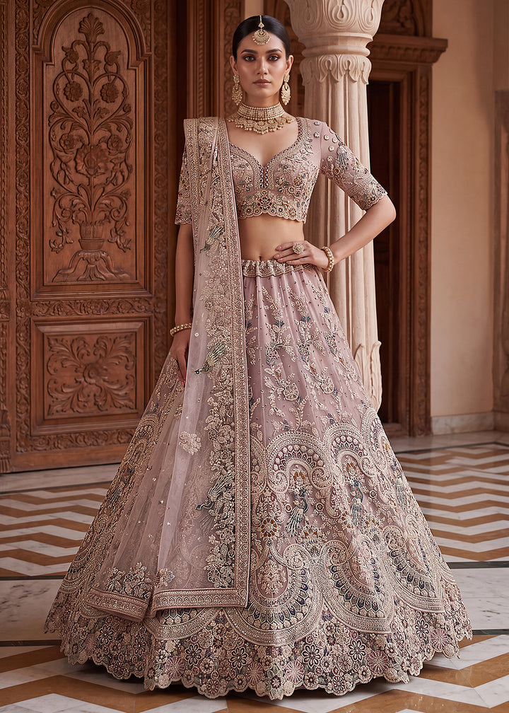 Buy Now Pink Heavy Embroidered Wedding Reception Lehenga Choli Online in US, UK, Canada, France, Italy, Germany, Sweden, UAE &amp; Worldwide at Empress Clothing.