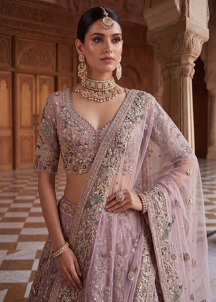Buy Now Pink Heavy Embroidered Wedding Reception Lehenga Choli Online in US, UK, Canada, France, Italy, Germany, Sweden, UAE &amp; Worldwide at Empress Clothing.