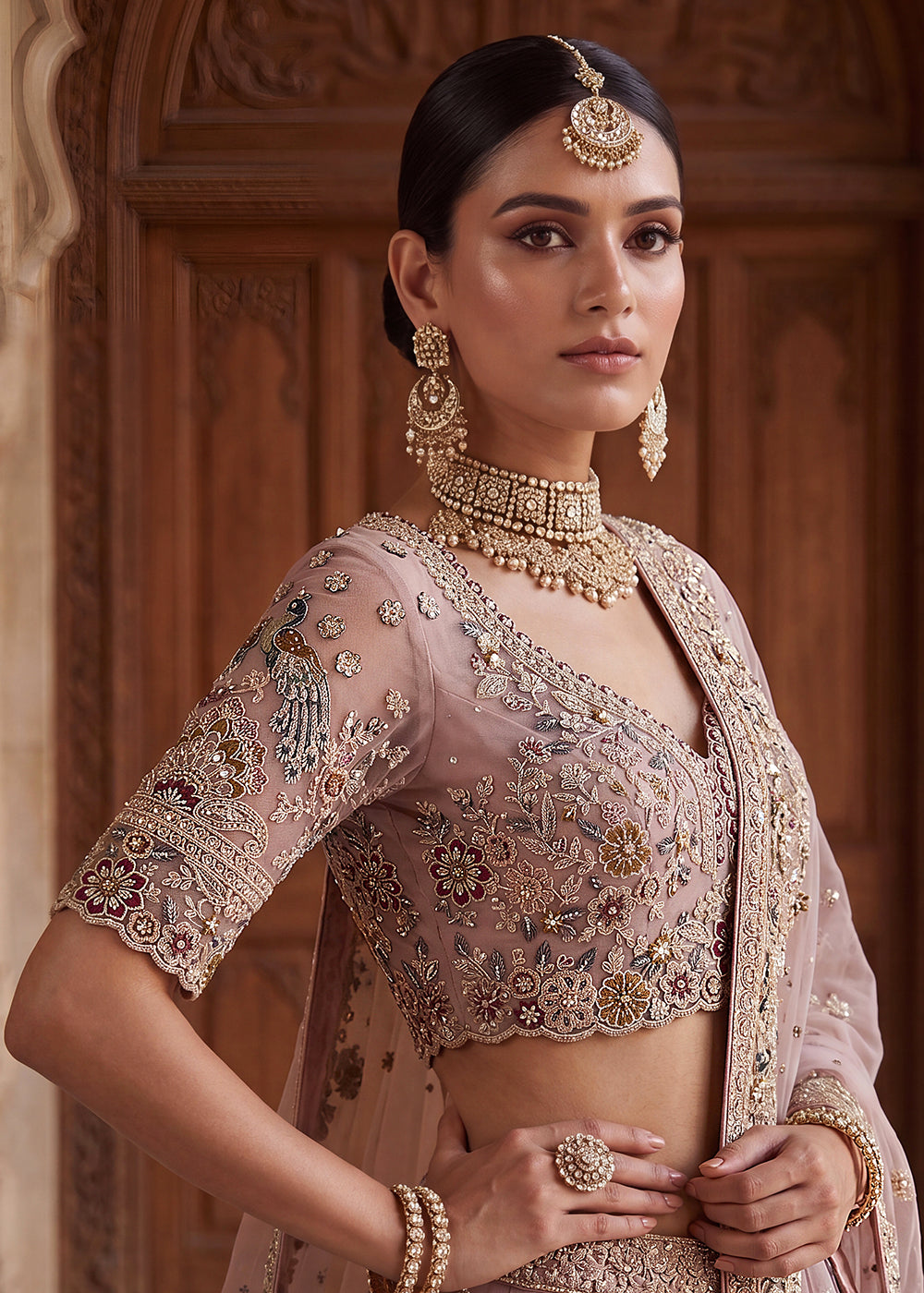 Buy Now Pink Heavy Embroidered Wedding Reception Lehenga Choli Online in US, UK, Canada, France, Italy, Germany, Sweden, UAE &amp; Worldwide at Empress Clothing.
