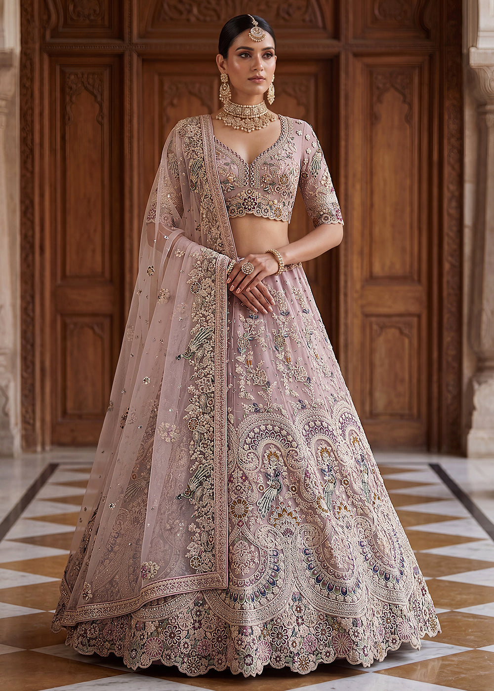 Buy Now Pink Heavy Embroidered Wedding Reception Lehenga Choli Online in US, UK, Canada, France, Italy, Germany, Sweden, UAE & Worldwide at Empress Clothing.