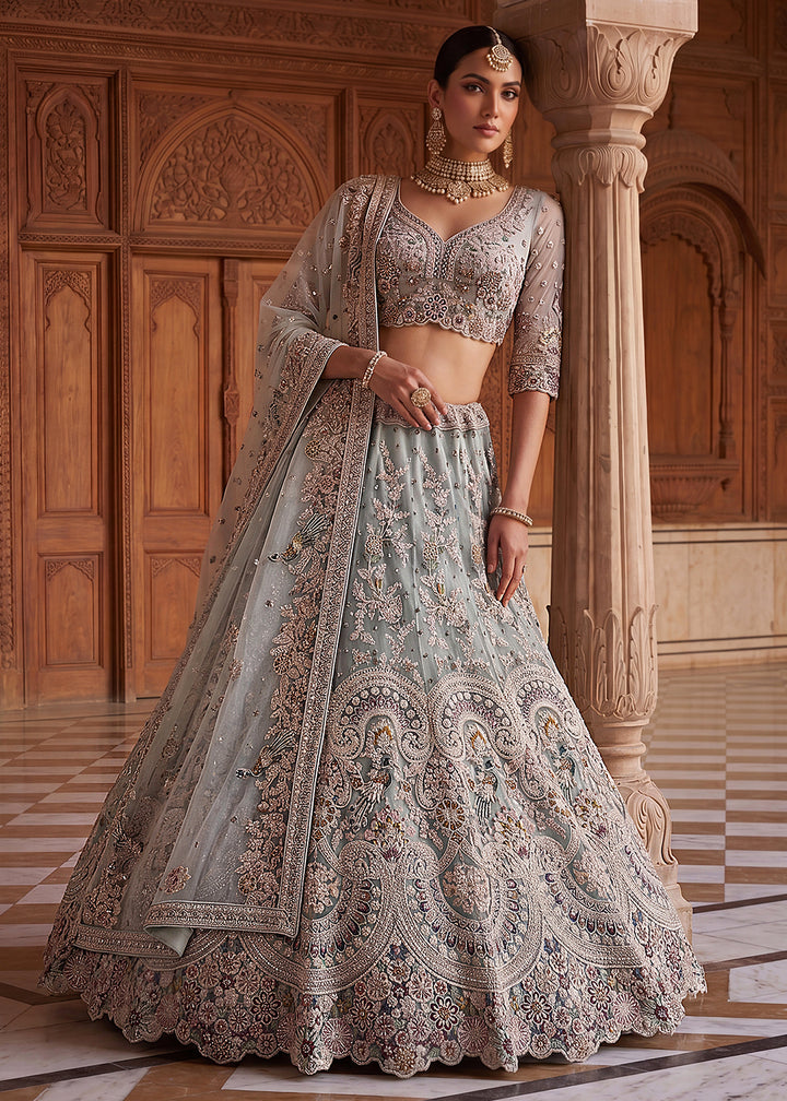 Buy Now Blue Heavy Embroidered Wedding Reception Lehenga Choli Online in US, UK, Canada, France, Italy, Germany, Sweden, UAE &amp; Worldwide at Empress Clothing.