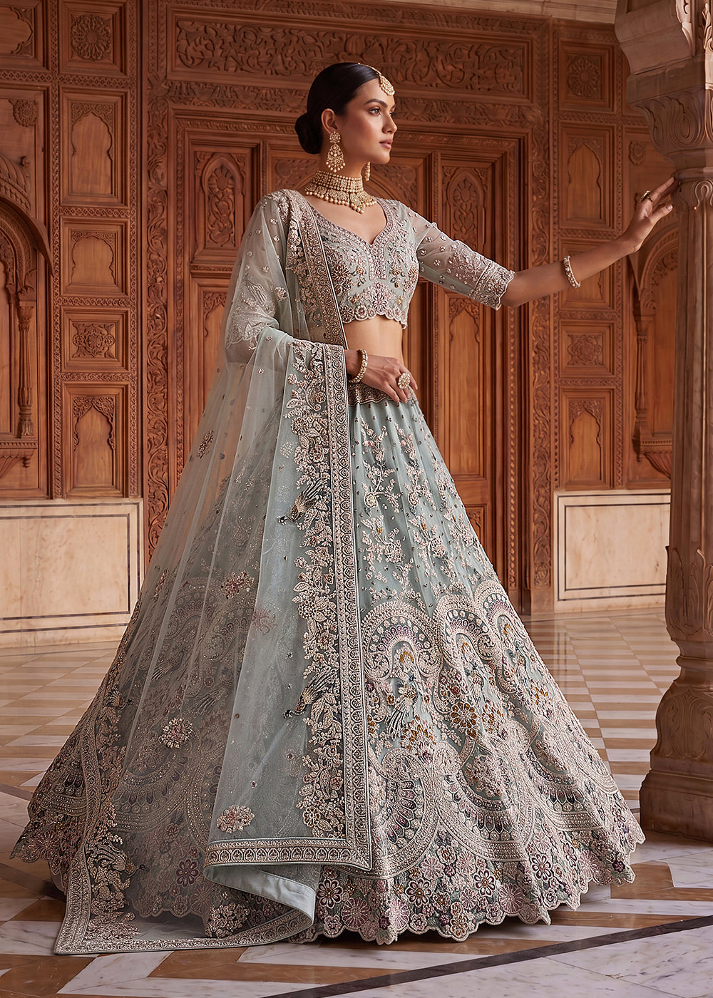 Buy Now Blue Heavy Embroidered Wedding Reception Lehenga Choli Online in US, UK, Canada, France, Italy, Germany, Sweden, UAE &amp; Worldwide at Empress Clothing.