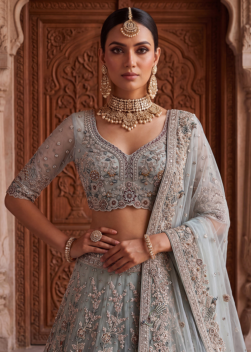 Buy Now Blue Heavy Embroidered Wedding Reception Lehenga Choli Online in US, UK, Canada, France, Italy, Germany, Sweden, UAE &amp; Worldwide at Empress Clothing.