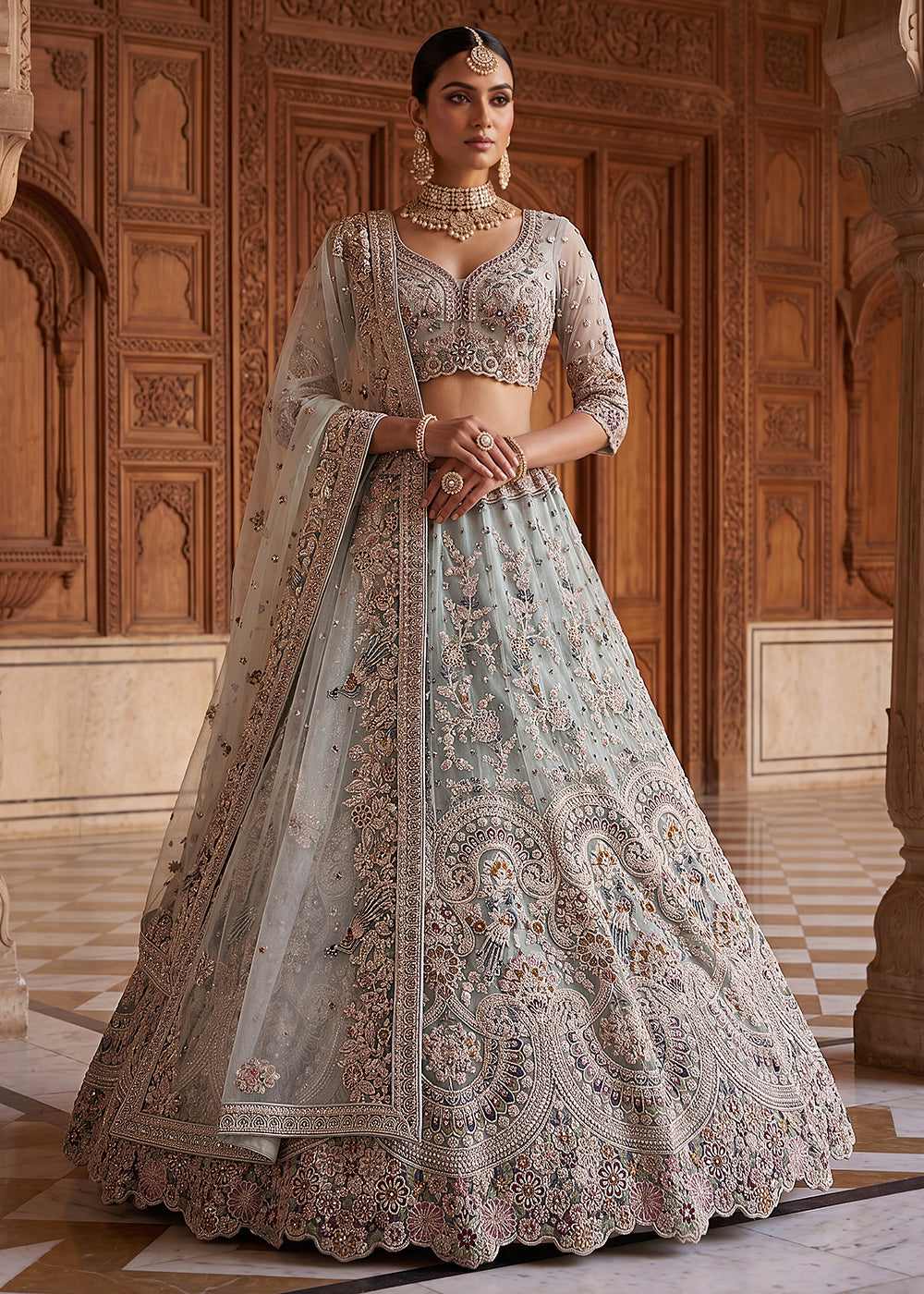 Buy Now Blue Heavy Embroidered Wedding Reception Lehenga Choli Online in US, UK, Canada, France, Italy, Germany, Sweden, UAE & Worldwide at Empress Clothing.