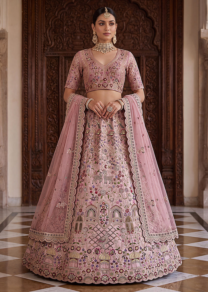 Buy Now Pink Heavy Embroidered Wedding Function Lehenga Choli Online in US, UK, Canada, France, Italy, Germany, Sweden, UAE &amp; Worldwide at Empress Clothing.