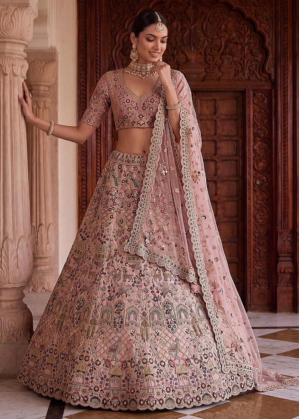 Buy Now Pink Heavy Embroidered Wedding Function Lehenga Choli Online in US, UK, Canada, France, Italy, Germany, Sweden, UAE & Worldwide at Empress Clothing.