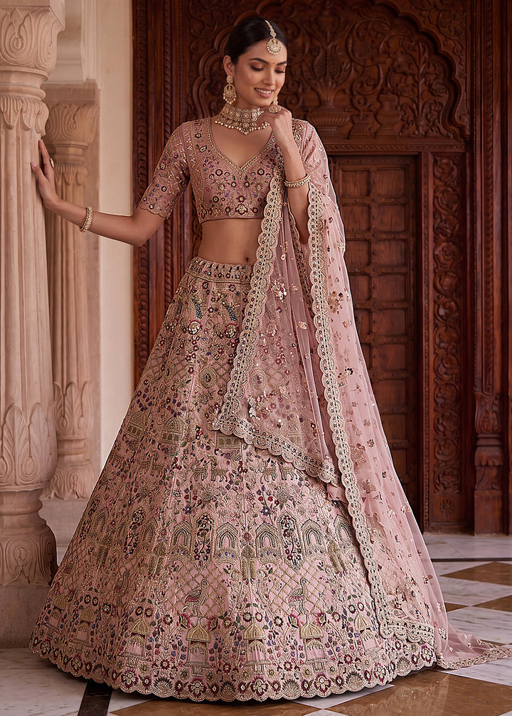 Buy Now Pink Heavy Embroidered Wedding Function Lehenga Choli Online in US, UK, Canada, France, Italy, Germany, Sweden, UAE &amp; Worldwide at Empress Clothing.