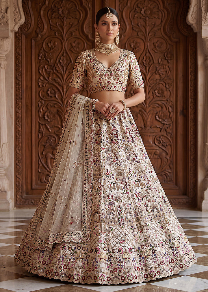 Buy Now Off White Heavy Embroidered Wedding Function Lehenga Choli Online in US, UK, Canada, France, Italy, Germany, Sweden, UAE &amp; Worldwide at Empress Clothing.