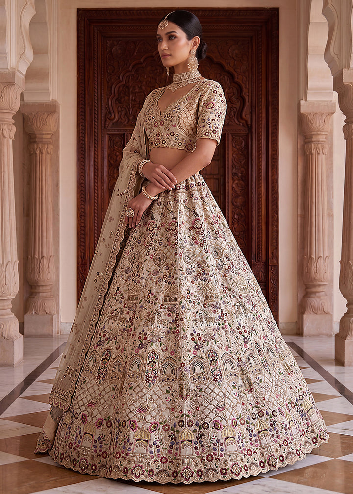 Buy Now Off White Heavy Embroidered Wedding Function Lehenga Choli Online in US, UK, Canada, France, Italy, Germany, Sweden, UAE &amp; Worldwide at Empress Clothing.