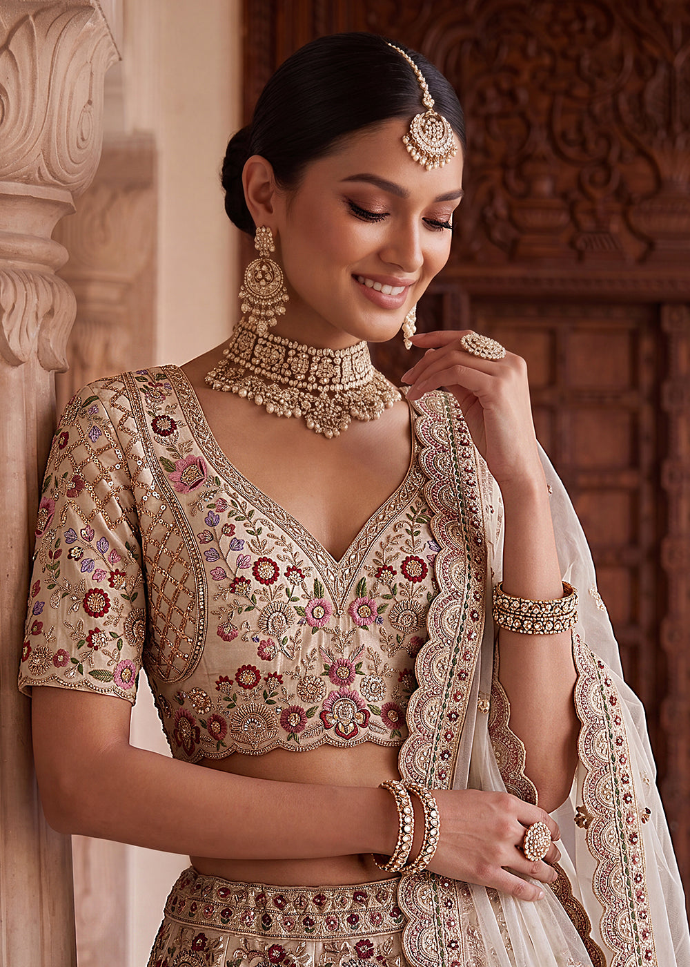 Buy Now Off White Heavy Embroidered Wedding Function Lehenga Choli Online in US, UK, Canada, France, Italy, Germany, Sweden, UAE & Worldwide at Empress Clothing.
