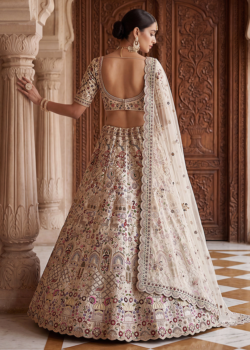 Buy Now Off White Heavy Embroidered Wedding Function Lehenga Choli Online in US, UK, Canada, France, Italy, Germany, Sweden, UAE &amp; Worldwide at Empress Clothing.